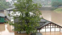 四川暴雨停歇 106人在洪災中喪生