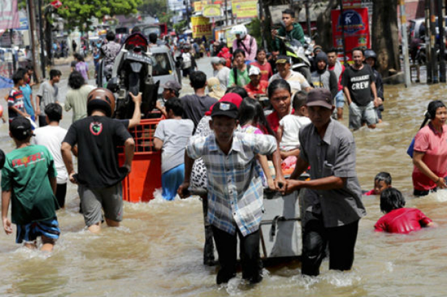 唐崇榮牧師發動社關行動援災民 促信徒與受苦者同行