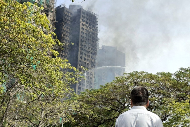 信徒專程到大埔宏福苑火災現場禱告 堅信神介入改變困境