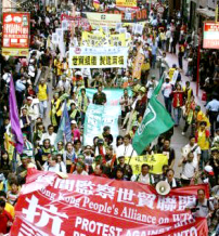 民間世貿大遊行搶先為明日會議揭序幕